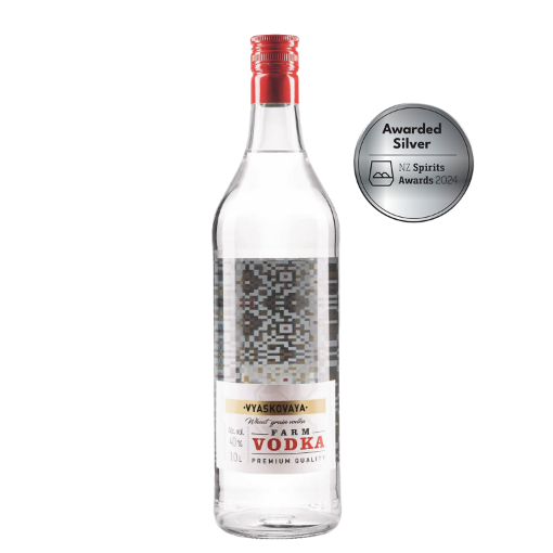 A clear glass bottle of Vodka Farm Premium, with a silver medal sticker highlighting its win at the New Zealand Spirits Awards 2024.